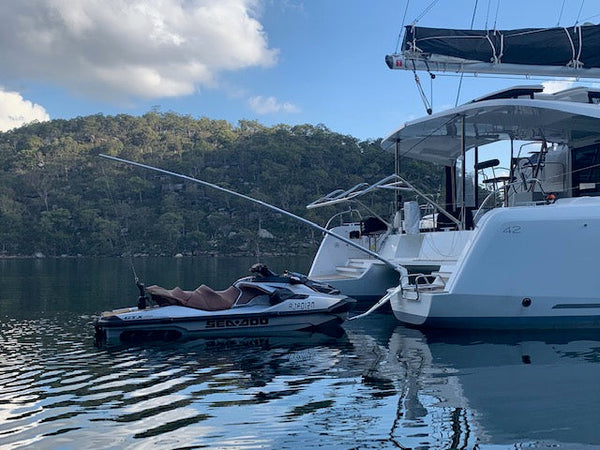 Client in Australia, MMT towing behind a Catamaran